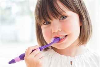 baby brushing teeth