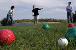 people playing bocce in the grass