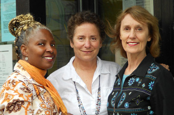 Wanda, Renita, and Melinda standing outside the MNRC