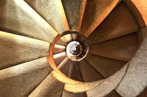 view down from the top of a stone winding staircase